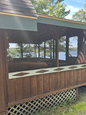 Screened in Porch with a view from every window.