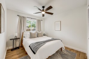 Our queen-size bed has the soft and firm Dream Cloud Premier mattress, soft linens, and a duvet.