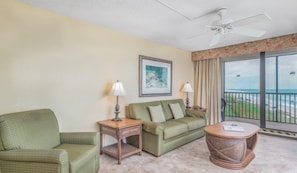 living_area_balcony_view_2BR_turtle_reef_club-720x420.jpg