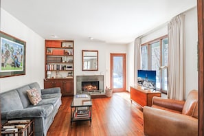 Sitting Room with Fireplace and Streaming TV