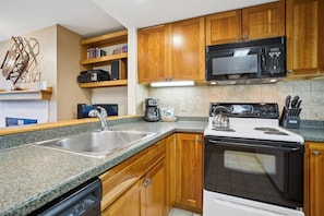 Upgraded kitchen, plenty of counterspace. Stocked to aid in cooking those home cooked meals