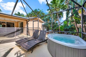 Heated pool with screen and hot tub