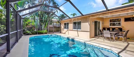 Heated pool with screen and hot tub