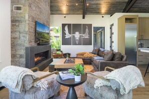 Settle into the plush upper level living room