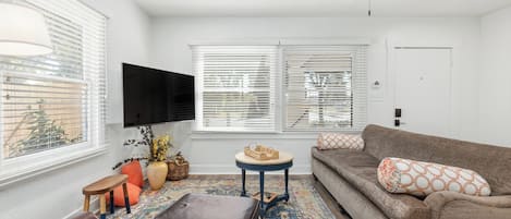 Living room with beautiful picture window facing the street.