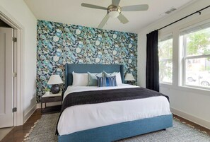 Immaculate Bedroom with Luxury Linens and Cozy Touches