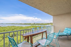 Relax on the Private, Covered Balcony and Enjoy the Serenity of the Intercoastal Waterway