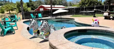 Full Gated Pool Area, Oasis pool with Baja Shelf and Hot tub.