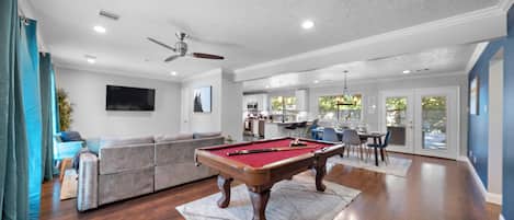 Full-size pool table included.