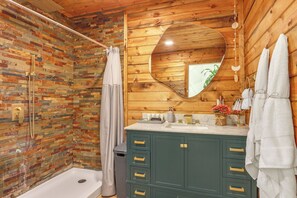 Spacious bathroom with walk-in closet.
