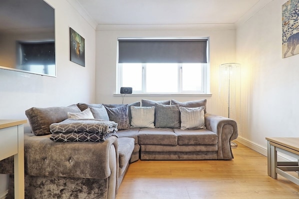 Bright and airy living room with ample seating and a modern feel.