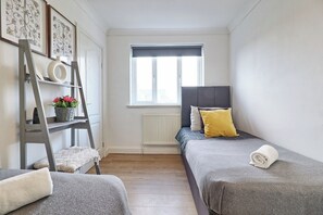 Comfortable twin beds, ideal for friends or family members.