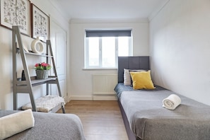 Comfortable twin beds, ideal for friends or family members.