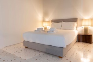 The apartment boasts two elegantly designed bedrooms, each adorned with a lavish Queen-size bed #elegance #comfort #portugal #pt #lisbon