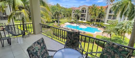 Enjoy views of one of several pools in PACIFICO.  This beautiful gated community provides resort-style amenities including multiple pools, on-site bar & grill and an oceanfront Beach Club with complimentary shuttle to/from the development.