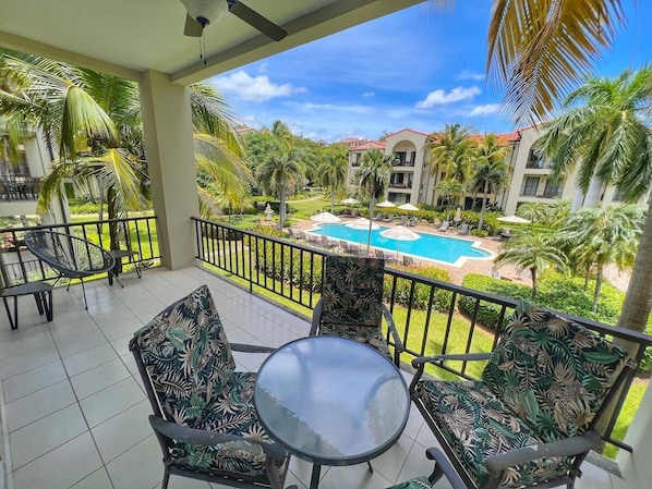 Enjoy views of one of several pools in PACIFICO.  This beautiful gated community provides resort-style amenities including multiple pools, on-site bar & grill and an oceanfront Beach Club with complimentary shuttle to/from the development.