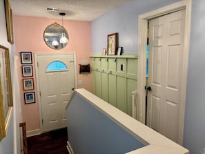 Plenty of hooks in the entryway for coats, hats, bags and more!
