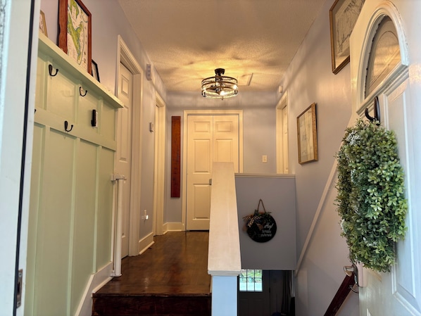 This cozy split-level captivates with perfect pastels immediately upon entry.