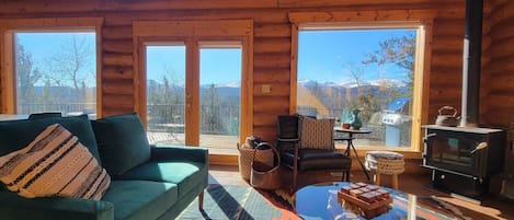 Amazing views, Lovely spaces. Welcome to Windsong Lodge. Main floor has a large living space, dining table that easily seats 8-12 (two leaves you can add), breakfast bar, huge kitchen, master bedroom with king bed, laundry and entry way!