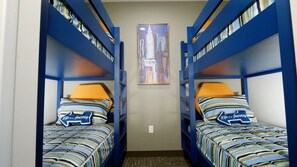 Comfortable Unit with 2 Twin bunk beds. The bunk bed area has an open entrance without a door. The set of bunk beds is located in its own cozy quarters!