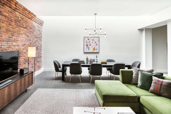 Living Area. Exact unit will be assigned upon arrival. Views, colors, and decor may vary.