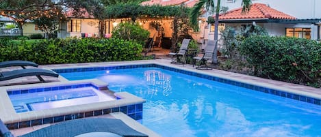 Estately Gardens is a luxurious Estate Pool Home in the highly sought after River District of Bradenton, FL