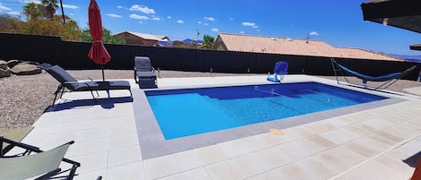 Come stay and play in this spacious modern home while enjoying Lake Havasu City. Blue skies and just as blue pool to kickstart any weekend!