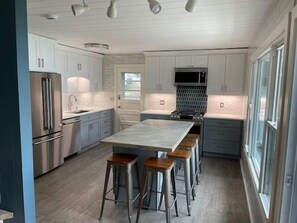 Island in kitchen with seating