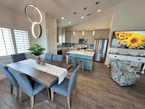 Fully stocked kitchen with dining room seating for 6