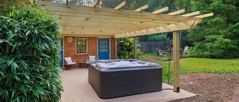 Relaxing outdoor with a hot tub and firepit