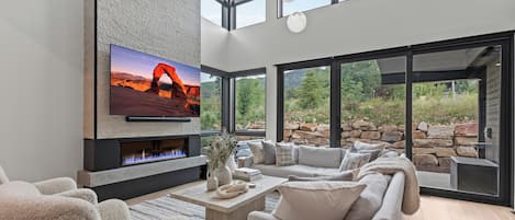 Large windows to let in natural lighting in the living area