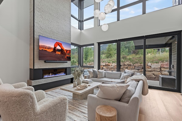 Large windows to let in natural lighting in the living area