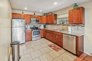 Indoors, Floor, Flooring, Kitchen, Refrigerator