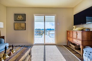 Living Area with Sliding Door leading to Back Sundeck