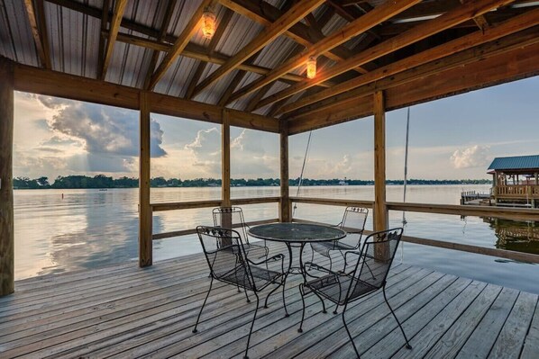 Covered pier with dining set