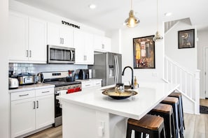 Fully stocked kitchen with island 