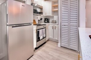 Stay Fresh, Dine in Style 🍴❄️ Experience comfort and convenience with our Airbnb's modern kitchen and generously-sized refrigerator.