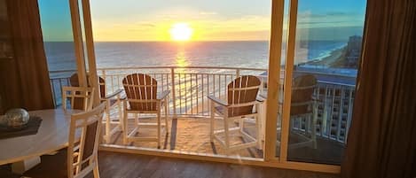 Relax on your oceanfront balcony while enjoying incredible sunrise views!