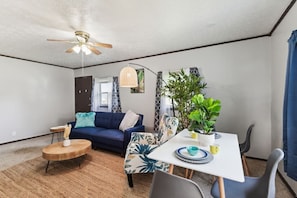 Gather the family in the spacious front room, or gather round the table for a meal or a board game.