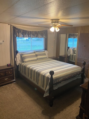 Master Bedroom with queen bed and attached bathroom