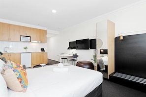 This spacious studio offers plenty of room to spread out and relax. Enjoy the comfortable bed and modern amenities.