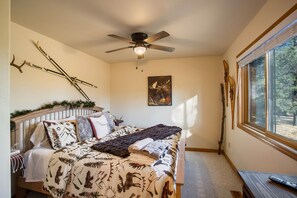 The main floor main suite features a king bed and smartTV