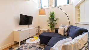 Relax after a long day visiting our beautiful city in front of the flat screen TV #comfort #airbnbporto