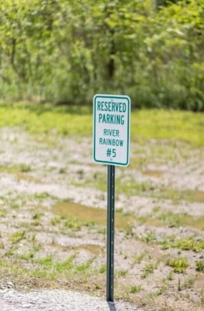 Assigned Parking. Additional parking in grass near parking lot. 