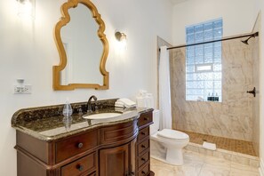 The full bathroom is Jack-and-Jill style, meaning that both bedrooms are connected through the bathroom