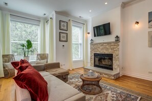 The living room windows bring in so much light
