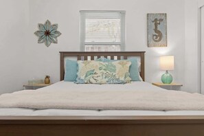Private bedroom with cozy bed.