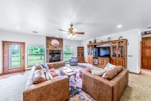 Living room with comfortable seating for six.  