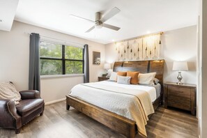 Master bedroom with King bed and patio access