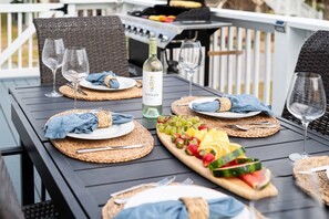 Deck with stainless grill, seating for 6 and night time string lights. Deck is gated to keep pets and little kids safe!